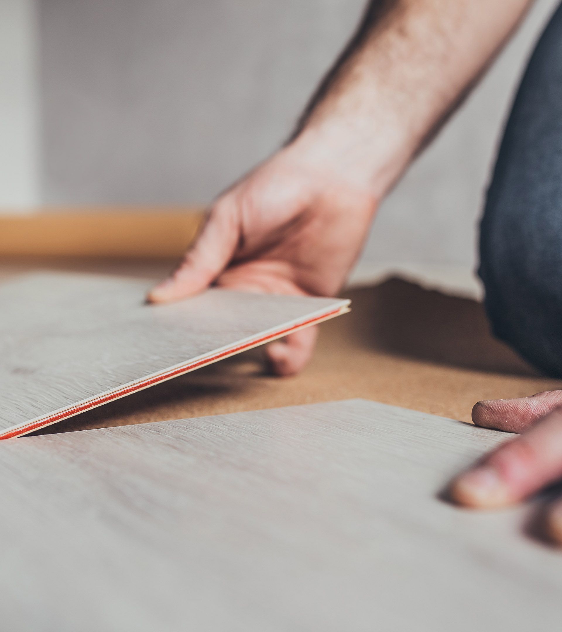 Man installing hardwood flooring